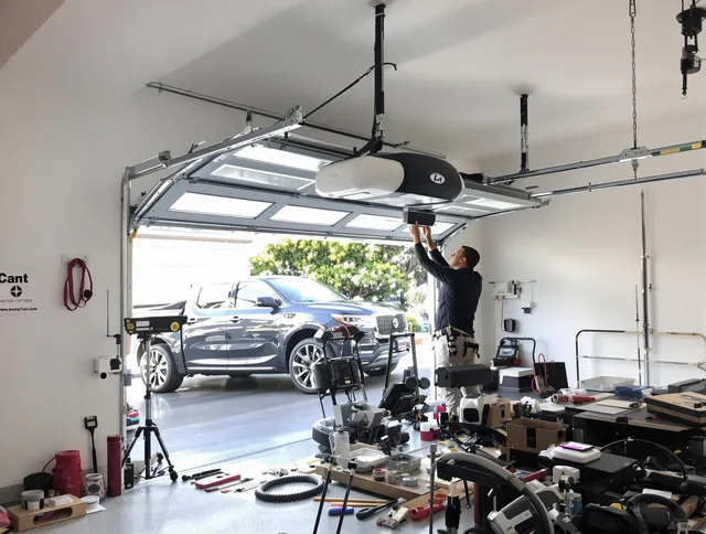 Grafton Garage Door Repair specialist installing smart garage door opener system in Grafton home