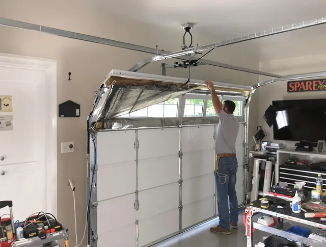Garage door section replacement by Grafton Garage Door Repair in Grafton